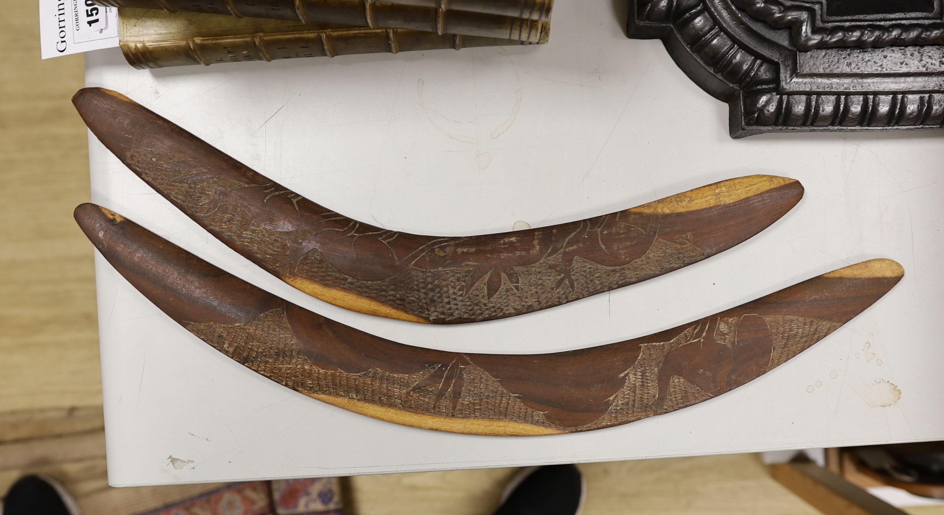 A 20th century Australian aboriginal spear and holder and 2 boomerangs., Spear 142 cms long.